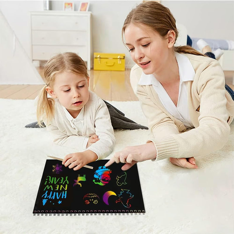 Kreativ regnbågeskrapbok