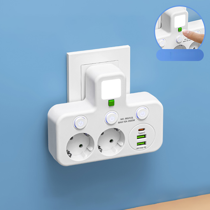 Platsbesparande grenuttag med lampa och USB-portar