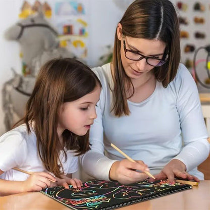 Kreativ regnbågeskrapbok