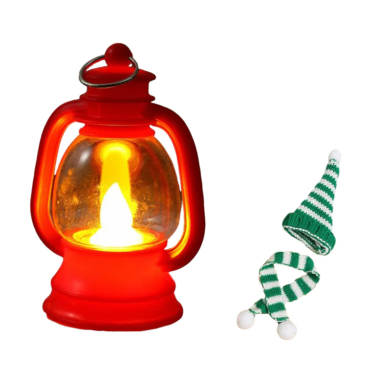 Mini snögubbelykta med mössor och halsdukar
