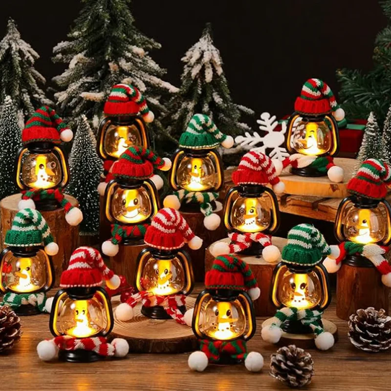 Mini snögubbelykta med mössor och halsdukar