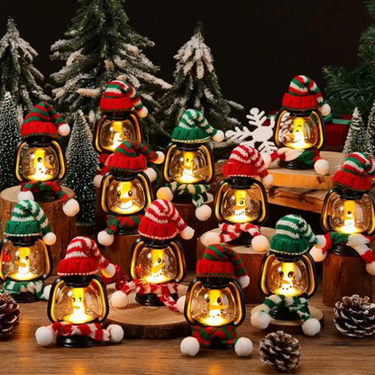 Mini snögubbelykta med mössor och halsdukar