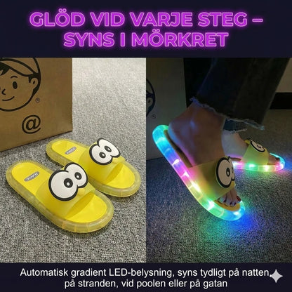 Söta tofflor med lysande tecknade motiv