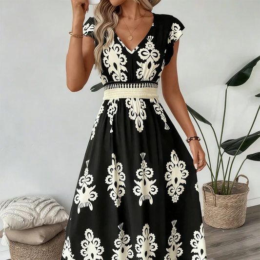 Elegant V-ringad klänning med barockmönster
